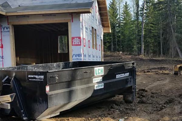 Home Construction Site with Dumpster Rental